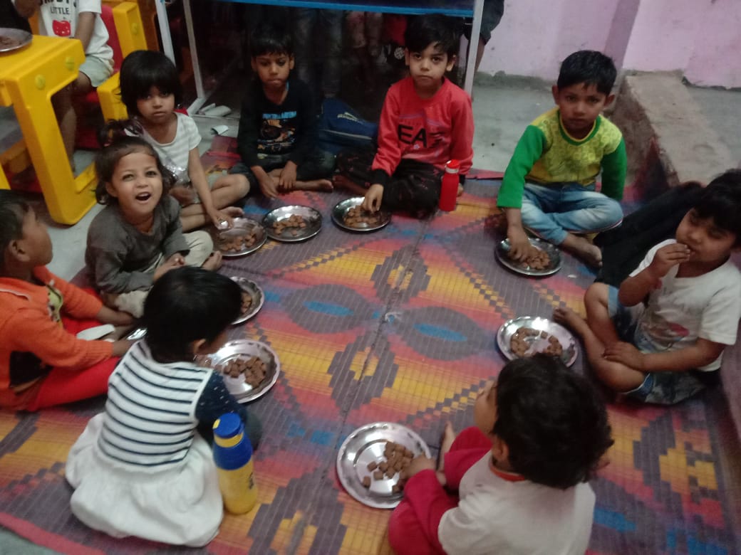 Children eating a nutritious meal at ASC